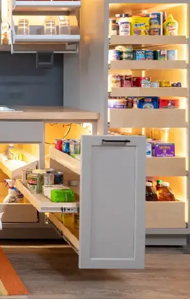 Kitchen cabinets full of kitchen items.
