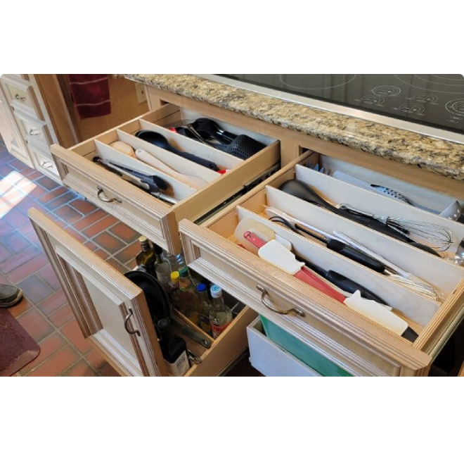 Utensils in drawer.