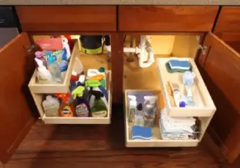 Under-sink drawers pulled out.