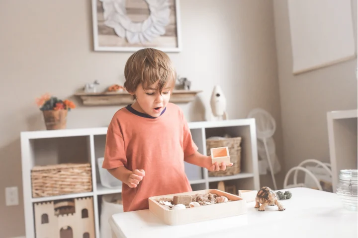 A child playing with toys.