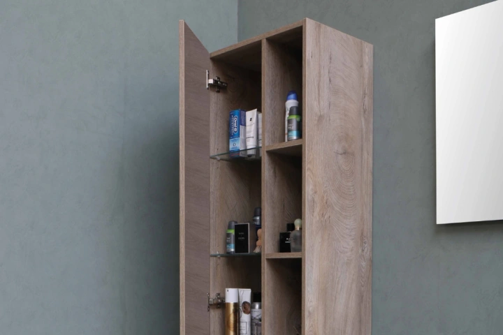 A shelf with bottles on it.