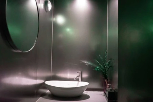 Dark bathroom design.