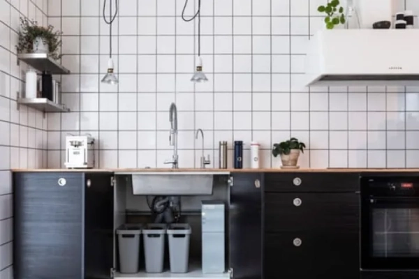 Dark themed kitchen.