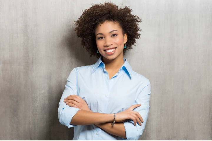 A professional lady smiling.