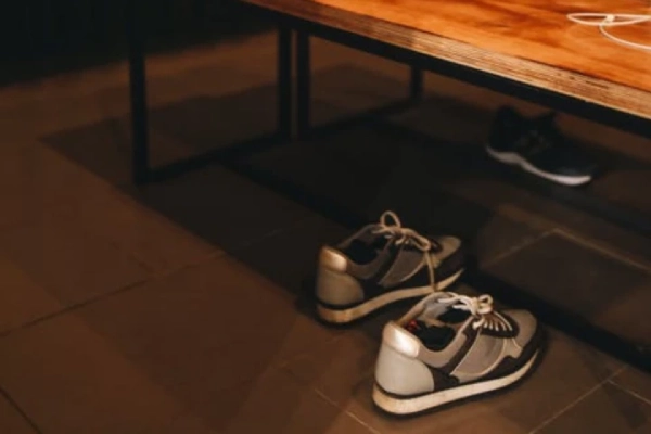 Under the counter storage, shoe nook, sneaker nook.